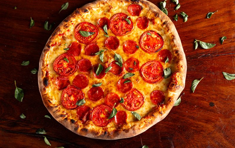 Dion's classic cheese pizza for catering